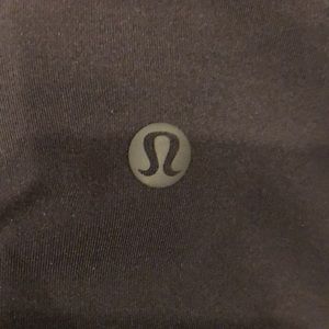 Like new LuLulemon black leggings with ribbed side detailing